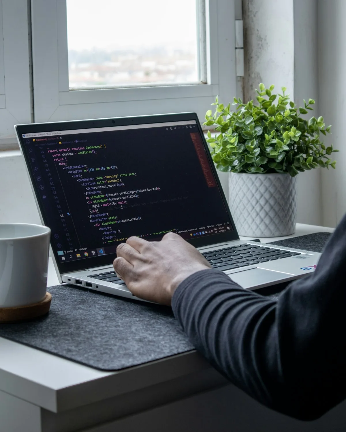 Developer coding for Belleville projects